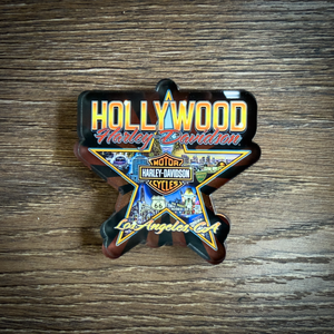 Hollywood Harley-Davidson Walk of Fame star-shaped magnet on a wooden surface