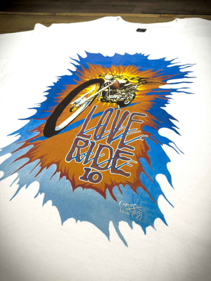 The Love Ride®10 White T-Shirt Front Design Tilted View